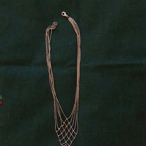 Delicate silver necklace with multiple chains